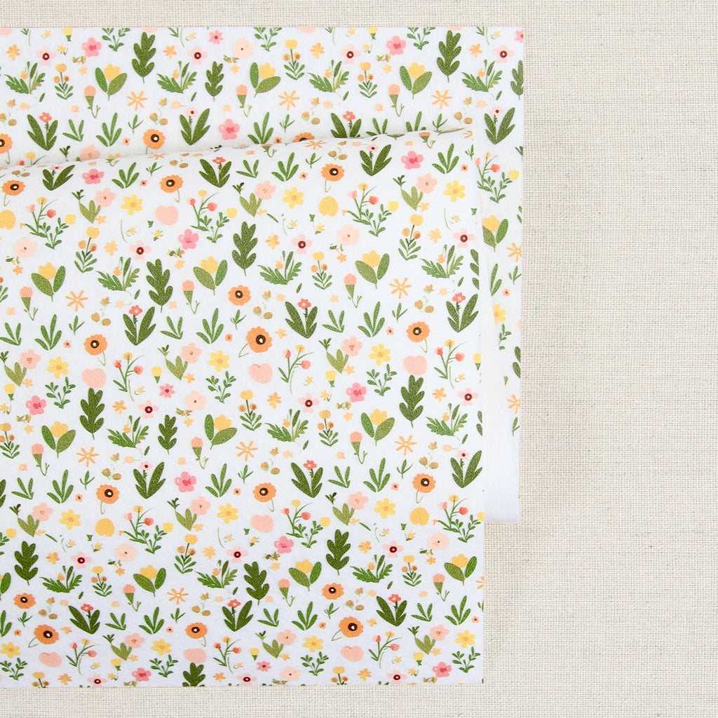 Floral Finesse in White Felt