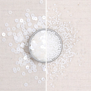 white metallic sequins, white beads