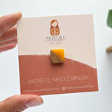 Square Needle Minders